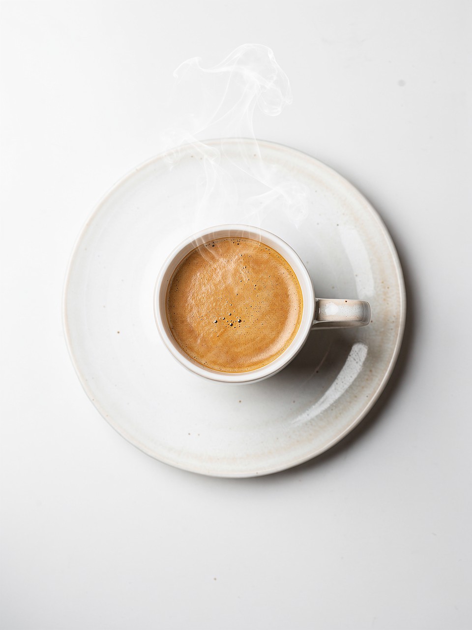 Steaming Hot Coffee in a Minimalist Cup