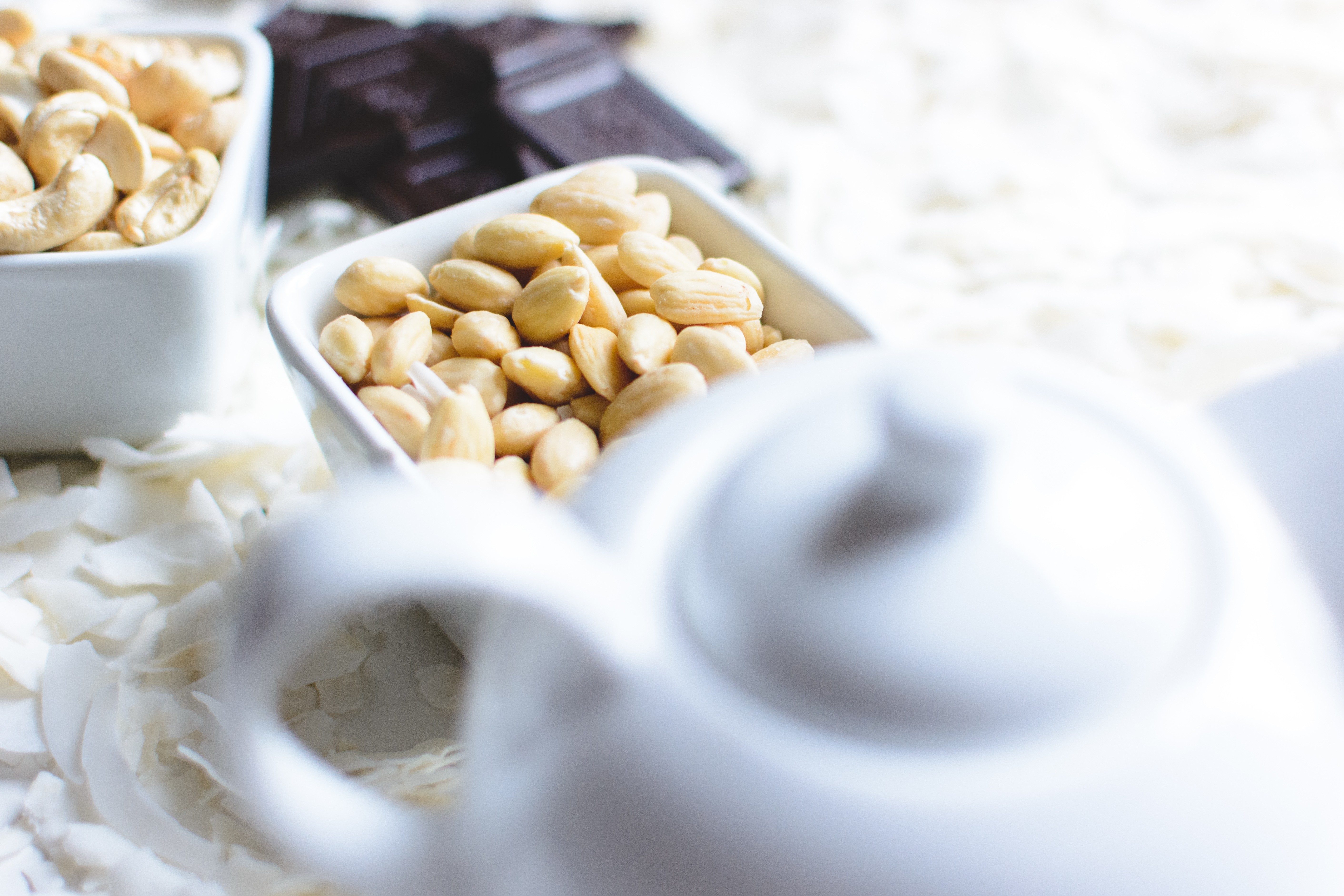 Blanched almonds in a ceramic bowl