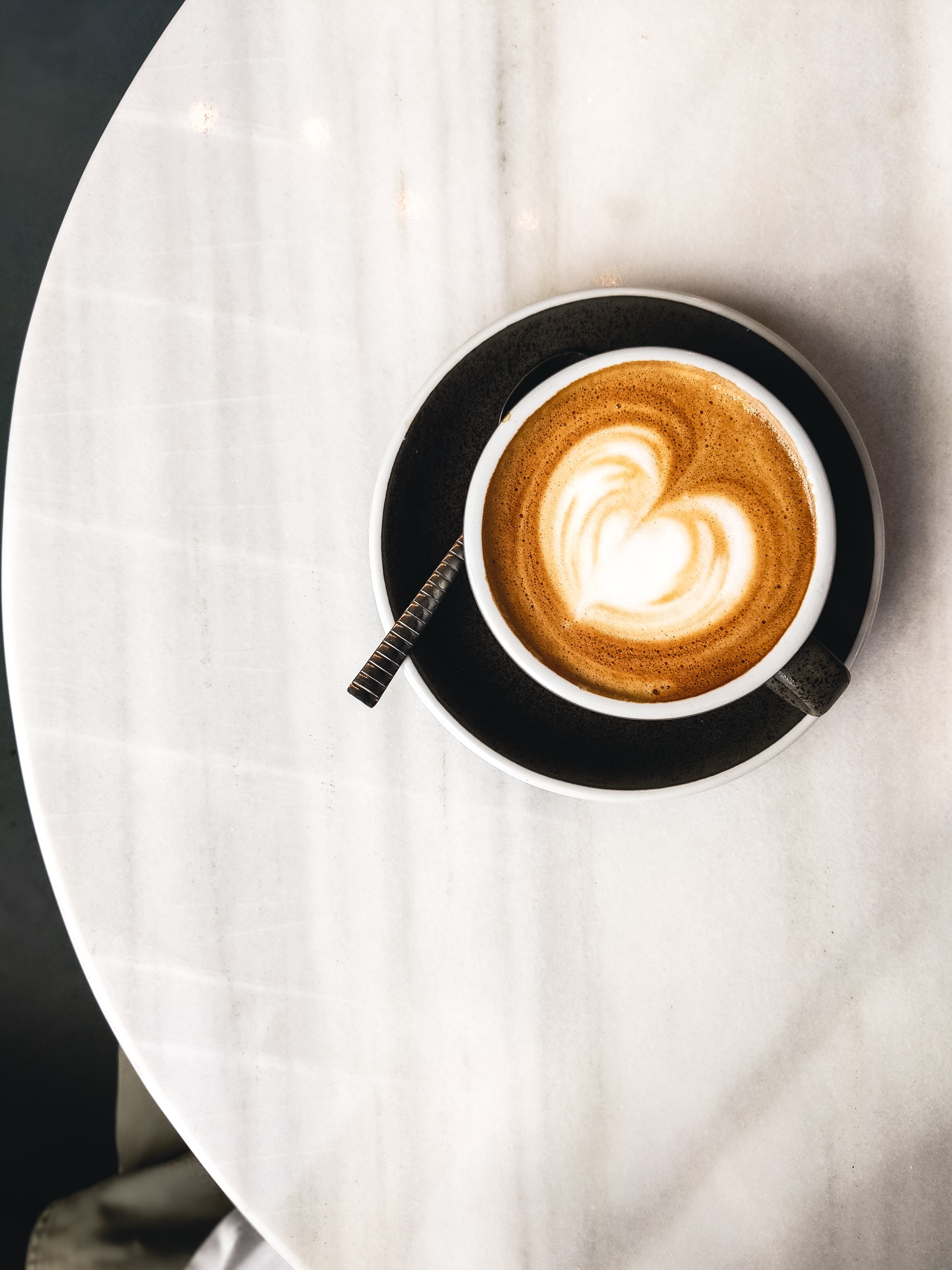 Coffee with milk with hearty latté art