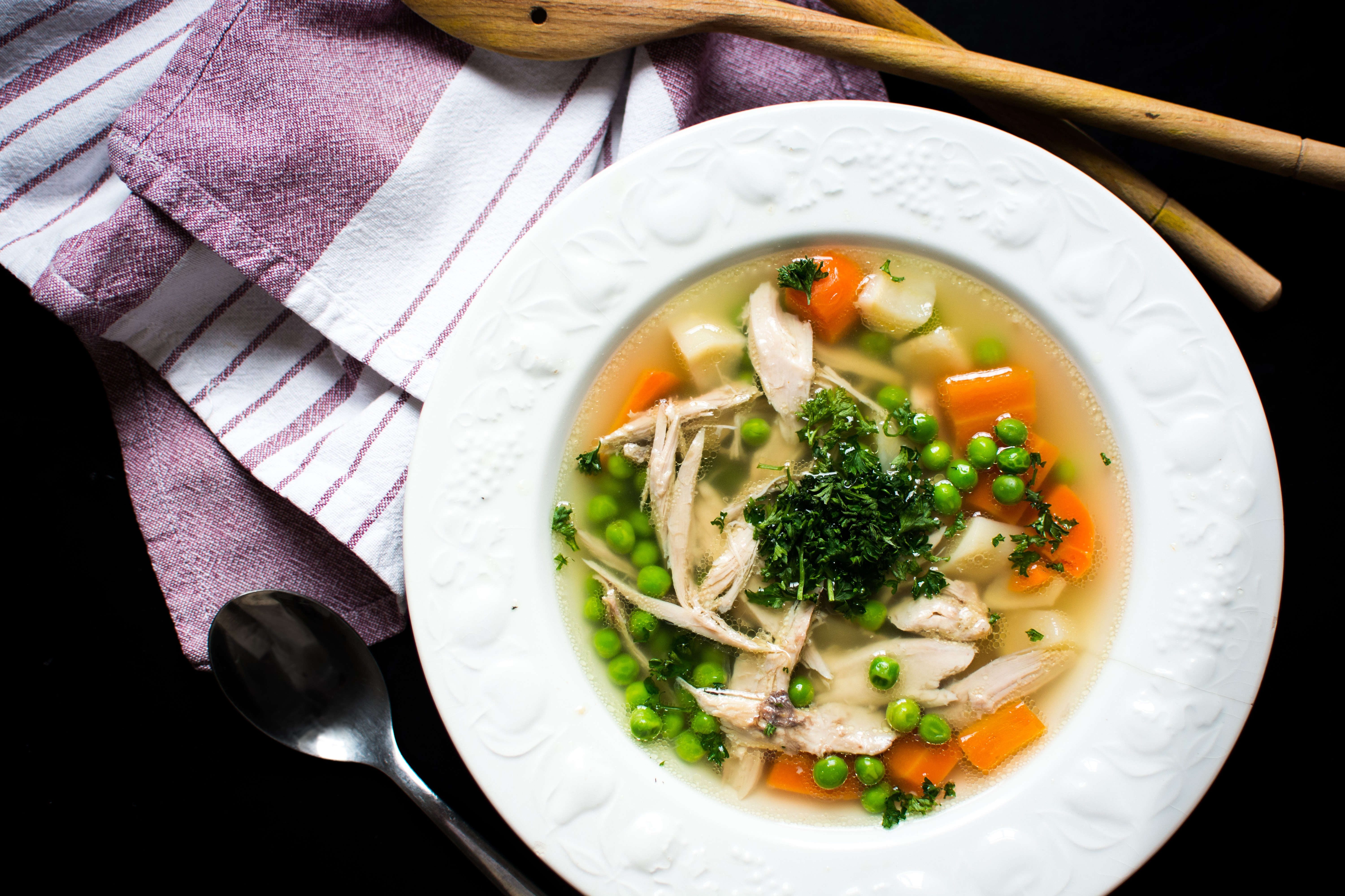 Homemade chicken broth with vegetables