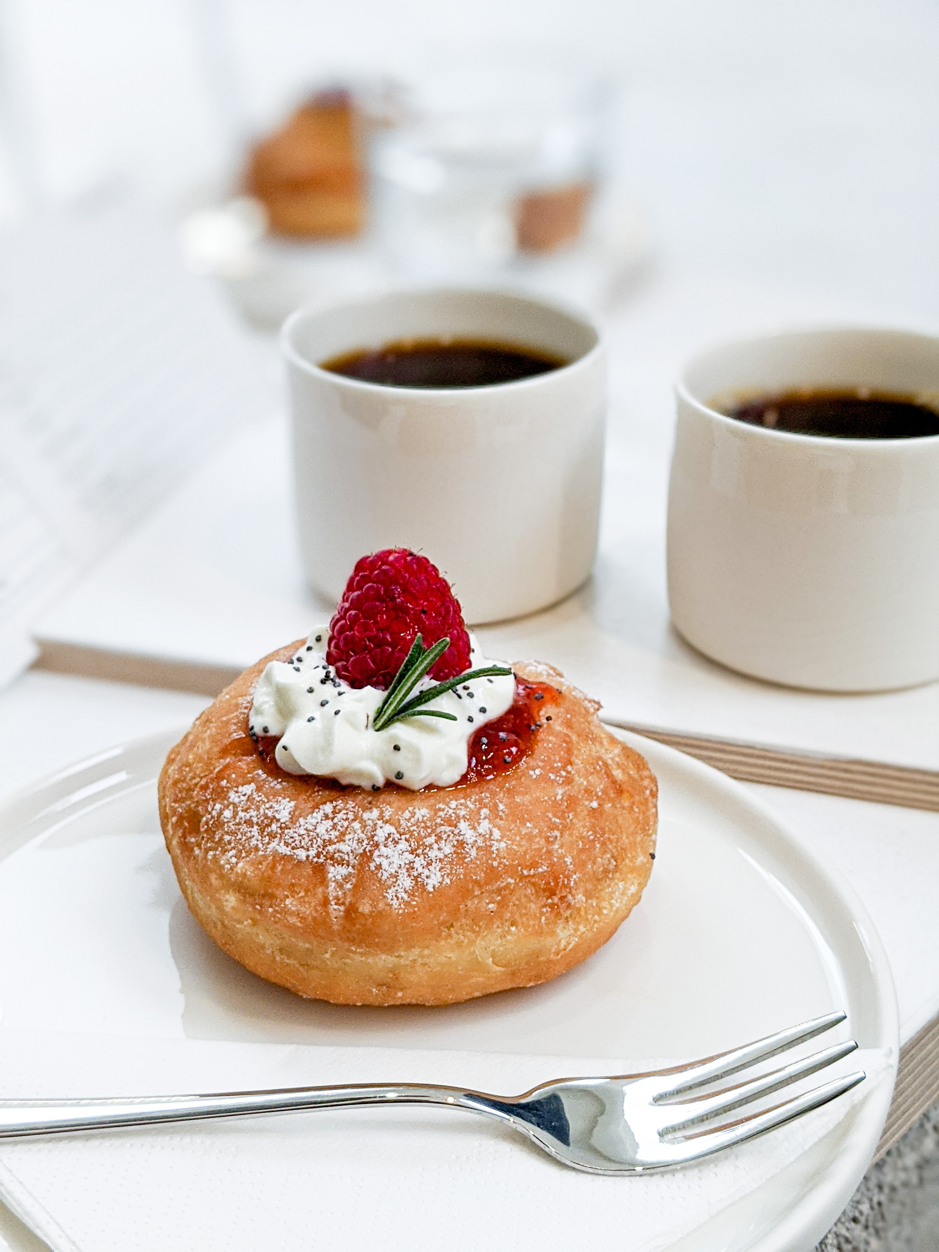 Raspberry donut with coffee