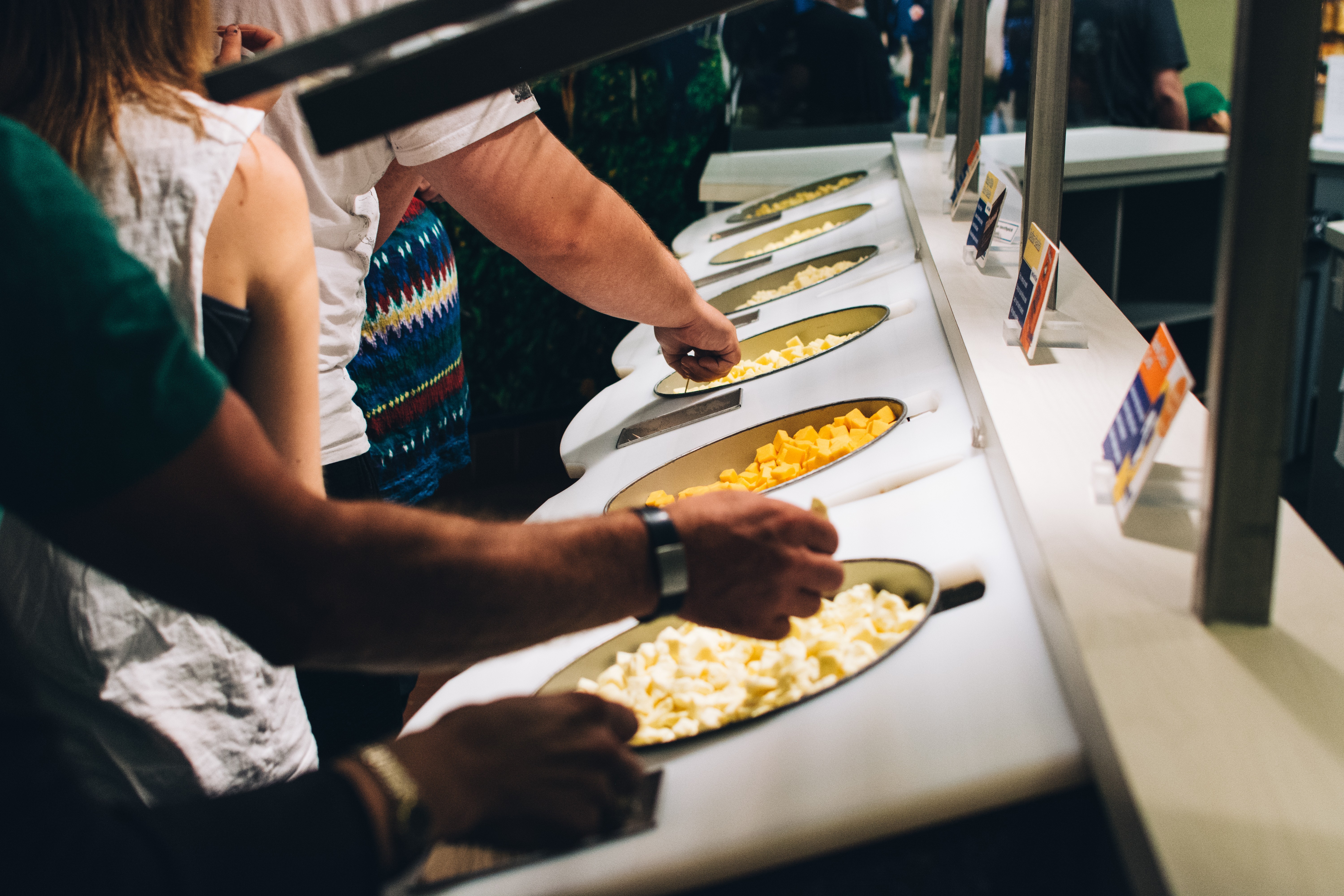 Tasting cheese in a cheese factory