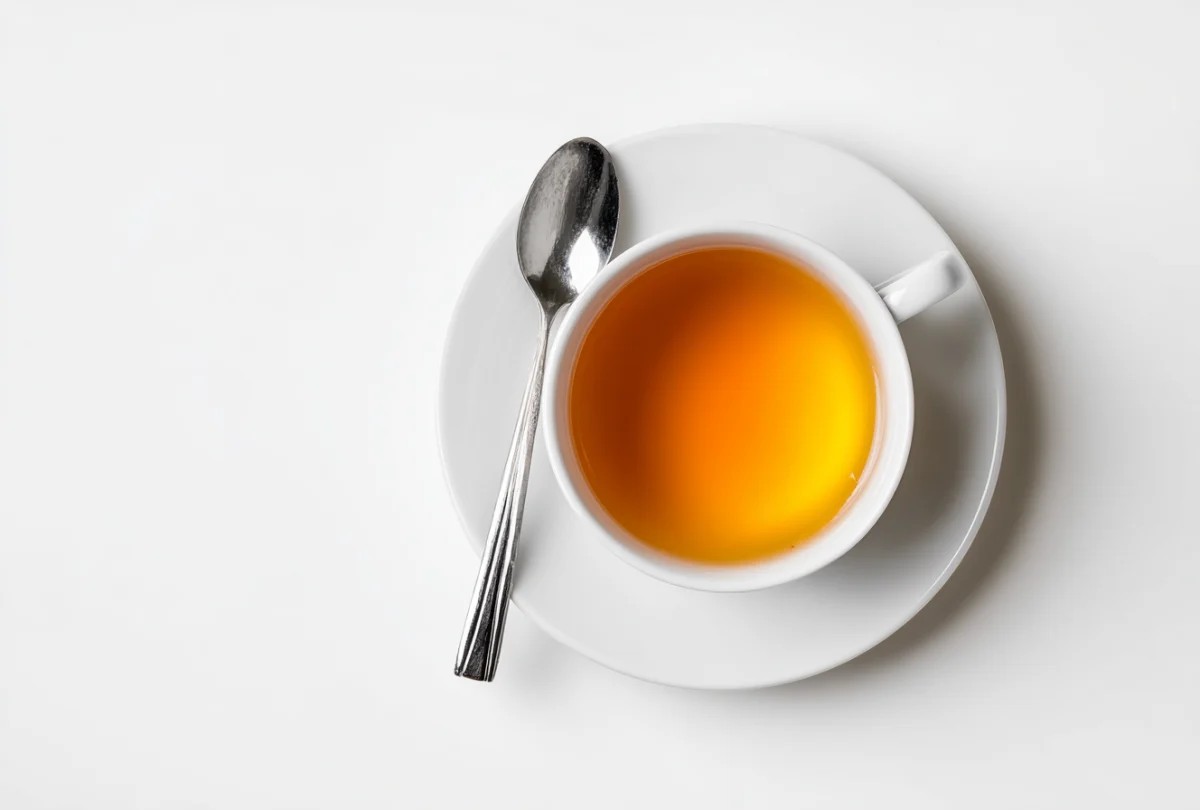 Warm Cup of Herbal Tea on White Background