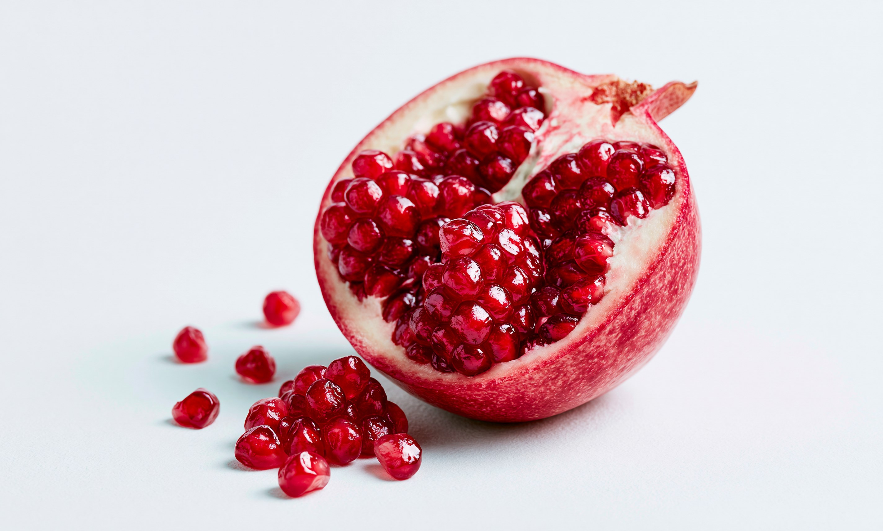 Fresh Pomegranate Halved with Seeds